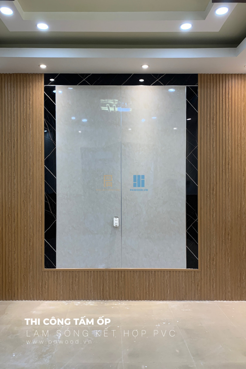 thi công tấm ốp lamri